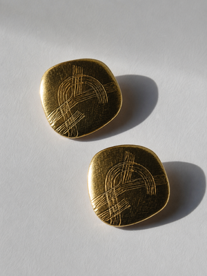 Yves Saint Laurent 1980's gold plated logo clip on earrings